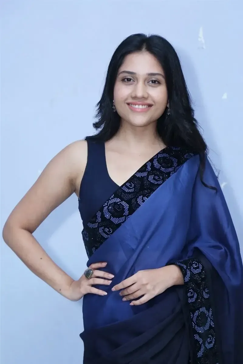 INDIAN ACTRESS RICHA JOSHI STILL IN BLUE SAREE AT MADHI MOVIE TRAILER LAUNCH 10